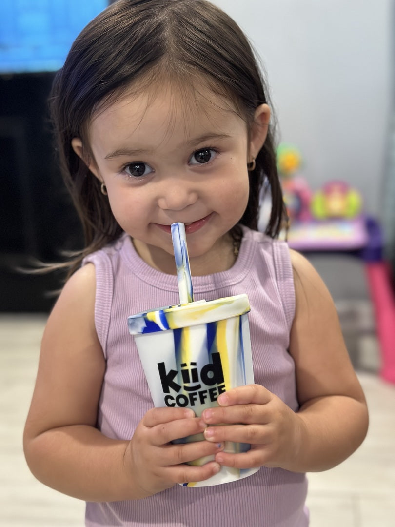 girl enjoying kiid coffee