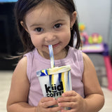 girl enjoying kiid coffee