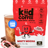 kiid coffee minty mocha package with cup, candy canes and chocolate on white background